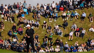 <p>Shane Lowry reads the green ahead of his birdie putt on the seventh green. Pic: Mandatory Credit ©INPHO/Ben Brady</p>