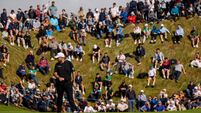 Shane Lowry reads the green ahead of his birdie putt on the seventh green 13/9/2026