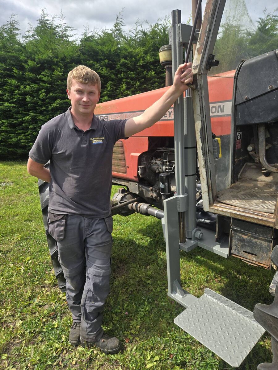 J.E. Engineering Ltd, a specialist in tractor repairs, and creator of 'The Mobility Lift', easing access to machinery. 