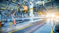 robots welding in a car factory