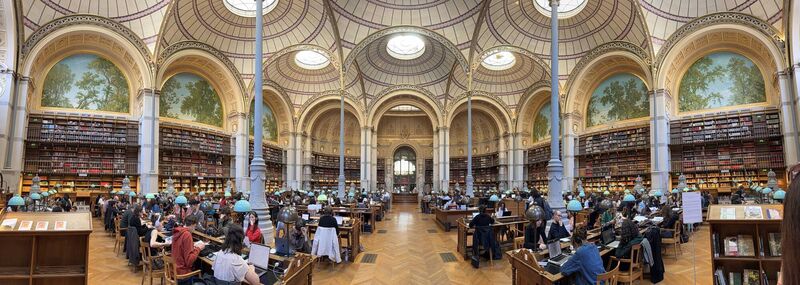 Students studying in April in the historic Richelieu National Library Oval Room in Paris, France. Students studying in April in the historic Richelieu National Library Oval Room in Paris, France.