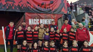 <p>Mission accomplished: the full Parkville United U11 squad and coaches with their signatures safely gathered.</p>