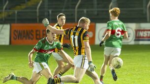 <p>Naomh Eoin's Adam Kenny fires a shot towards the Ballon posts.</p> <p>Naomh Eoin's Adam Kenny fires a shot towards the Ballon posts.</p>