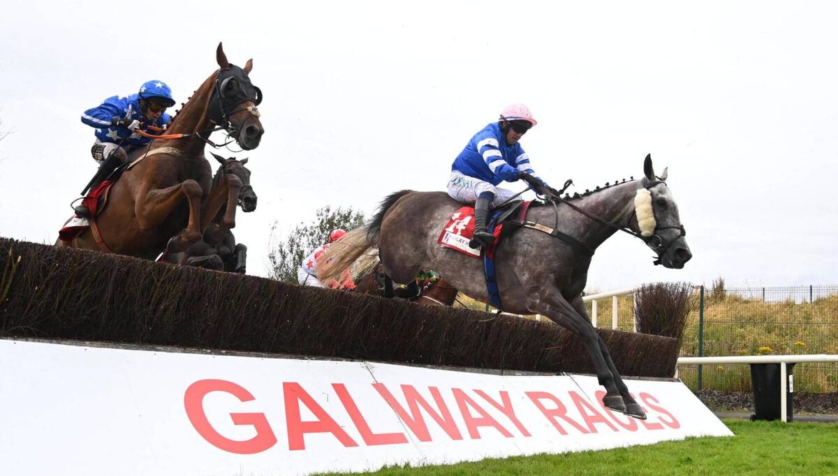 Jukebox Johnny (right) ridden by Darragh O'Keeffe on his way to winning the Kinlay Hostel Handicap Chase at the 2026 Galway Races Summer Festival. Picture: PA Wire 