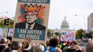 <p>Demonstrator rally on Pennsylvania Avenue during a No Kings protest in Washington, Saturday, Oct. 18, 2025. (AP Photo/Jose Luis Magana)</p> <p>Demonstrator rally on Pennsylvania Avenue during a No Kings protest in Washington, Saturday, Oct. 18, 2025. (AP Photo/Jose Luis Magana)</p>