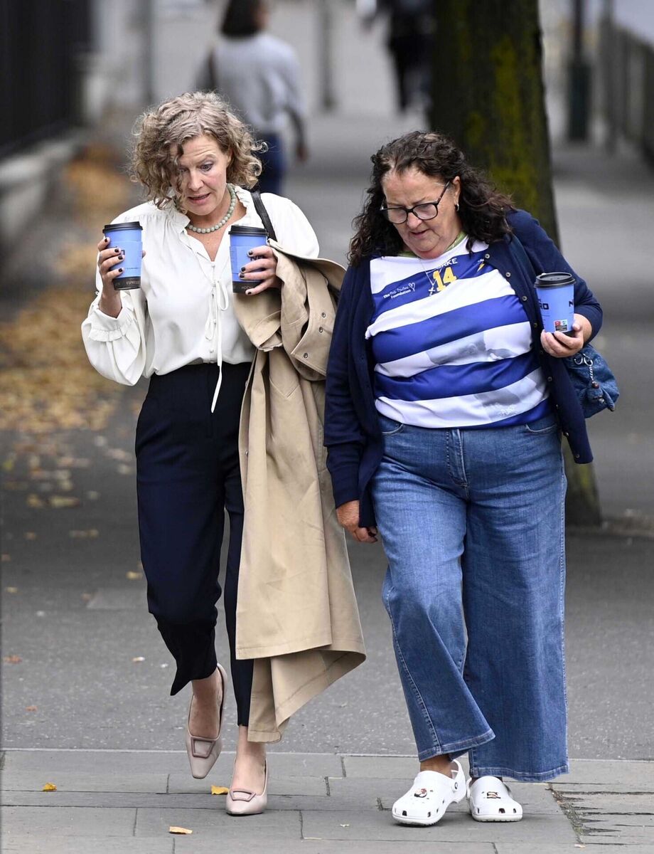 Fiona Donohoe (left), the mother of 14-year-old Noah Donohoe, arriving at Belfast Coroner's Court, where the inquest into the death of her son, who was found dead in a storm drain in north Belfast in June 2020, six days after he went missing while cycling to meet friends, is taking place. Picture: Mark Marlow/PA Wire Fiona Donohoe (left), the mother of 14-year-old Noah Donohoe, arriving at Belfast Coroner's Court, where the inquest into the death of her son, who was found dead in a storm drain in north Belfast in June 2020, six days after he went missing while cycling to meet friends, is taking place. Picture: Mark Marlow/PA Wire