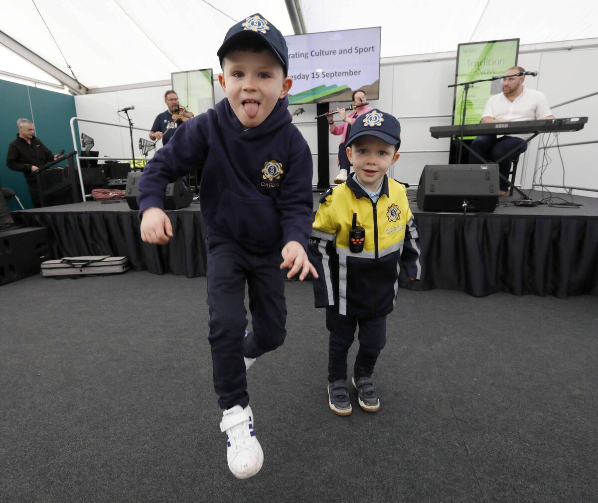 Bryan and Noah Keaveny from Tipperary having a dance at the Wild Turkey's performance in the National Concert Hall's tent in the Celebrating Culture and Sport Hub in the ploughing. Picture: Mark Stedman Bryan and Noah Keaveny from Tipperary having a dance at the Wild Turkey's performance in the National Concert Hall's tent in the Celebrating Culture and Sport Hub in the ploughing. Picture: Mark Stedman