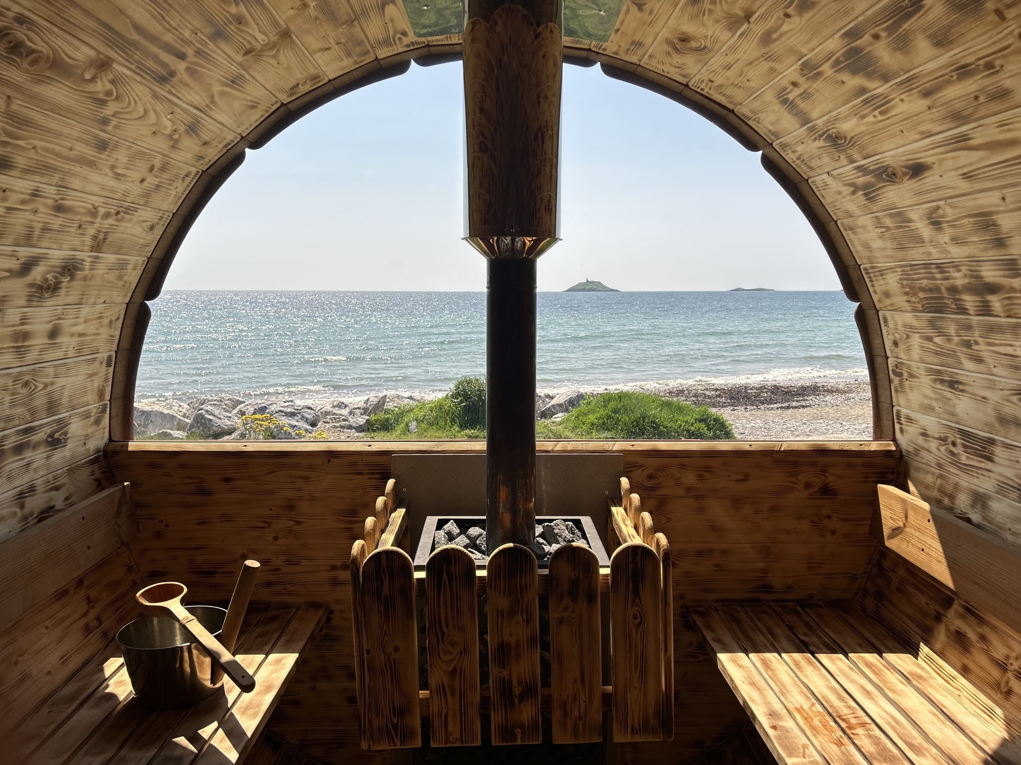 Ireland's latest staycation trends: Coastal Cabins on Garryvoe Beach in East Cork are one of the new must-visit activities attracting visitors to Irish coastal attractions. 