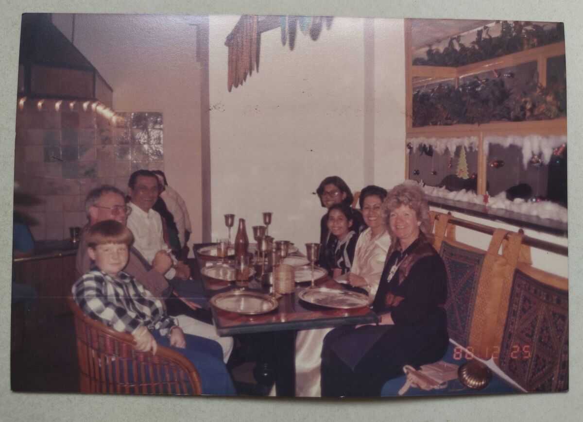 The Mehtas and the Quirks enjoying a Christmas dinner at a restaurant in Mumbai, India, in 1988. The Mehtas and the Quirks enjoying a Christmas dinner at a restaurant in Mumbai, India, in 1988.