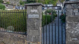 <p>8 North Abbey Square, North Mall is inside a railed and gated communal garden</p>