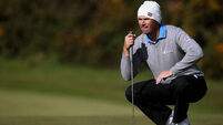 Harrington in contention while McIlroy battles to make cut