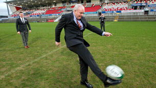 Martin McGuinness attempts a cross bar challenge with Brian O'Driscoll 18/1/2016