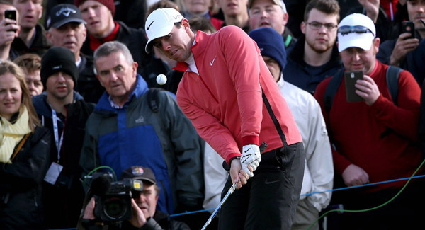 Rory McIlroy and Justin Rose in action at the Frys.com Open