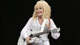 <p>Dolly Parton performing on the Pyramid Stage at the Glastonbury Festival, at Worthy Farm in Somerset.</p>
