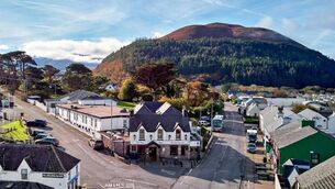 <p>Pretty as a picture: Glenbeigh village setting for the Towers Hotel, which is up for sale for €4m</p> <p>Pretty as a picture: Glenbeigh village setting for the Towers Hotel, which is up for sale for €4m</p>