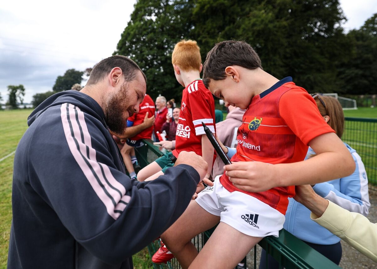 Van Der Merwe signs an autograph for a young fan after an open training session. Pic: Ben Brady/Inpho Van Der Merwe signs an autograph for a young fan after an open training session. Pic: Ben Brady/Inpho