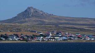 Mount Tumbledown behind Stanley on the Falkland Islands (Ricardo Mazalan/AP)