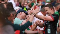 Andy Moran celebrates with fans after the match 26/7/2026