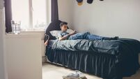 Teenager using Smartphone at Home