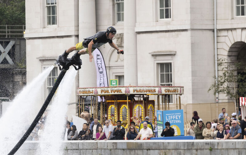 Fly-boarder James Prestwood from the UK entertains crowds at the DCC Liffey Festival, in front of the Custom House, Dublin. Fly-boarder James Prestwood from the UK entertains crowds at the DCC Liffey Festival, in front of the Custom House, Dublin.