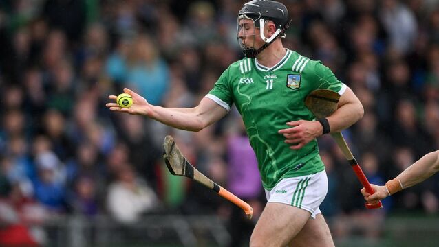 <p>Aidan O’Connor of Limerick handpasses the sliotar. Pic: Brendan Moran/Sportsfile</p>