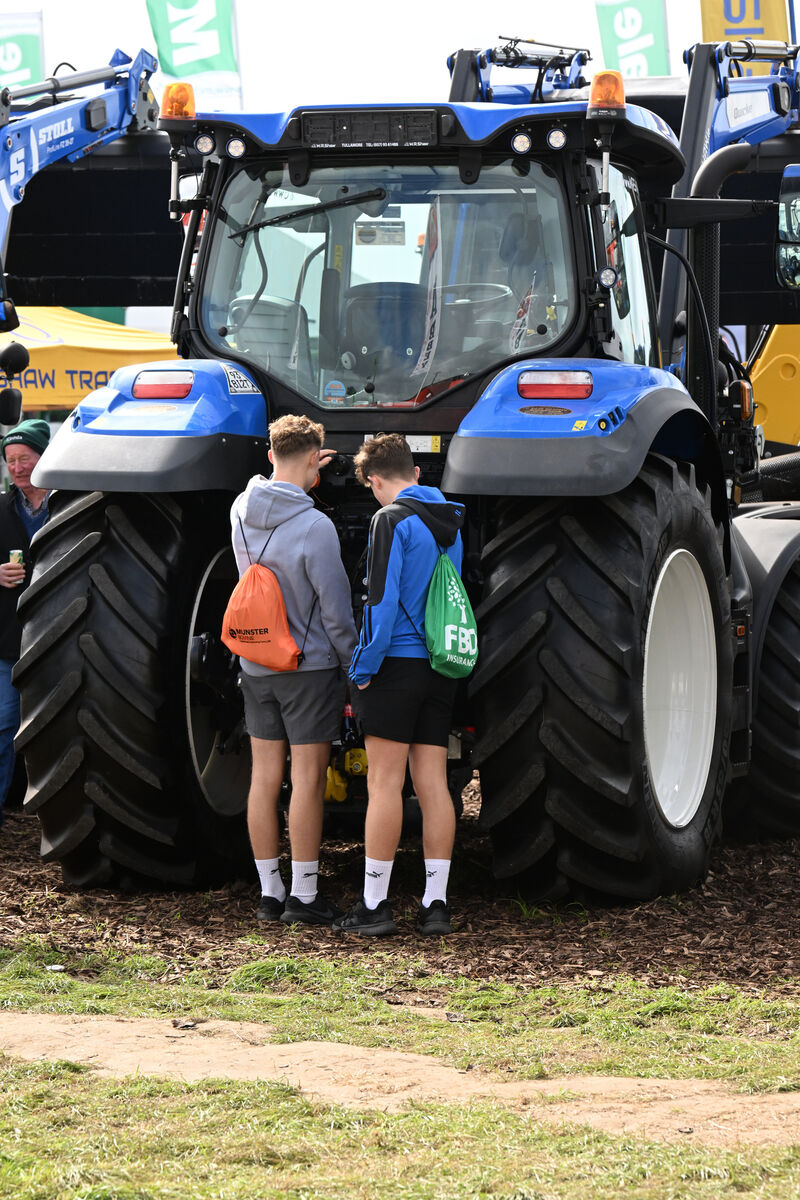 Students inspecting a tractor on day three of the National Ploughing Championships 2026 at Screggan, Tullamore, Co Offaly. Students inspecting a tractor on day three of the National Ploughing Championships 2026 at Screggan, Tullamore, Co Offaly.