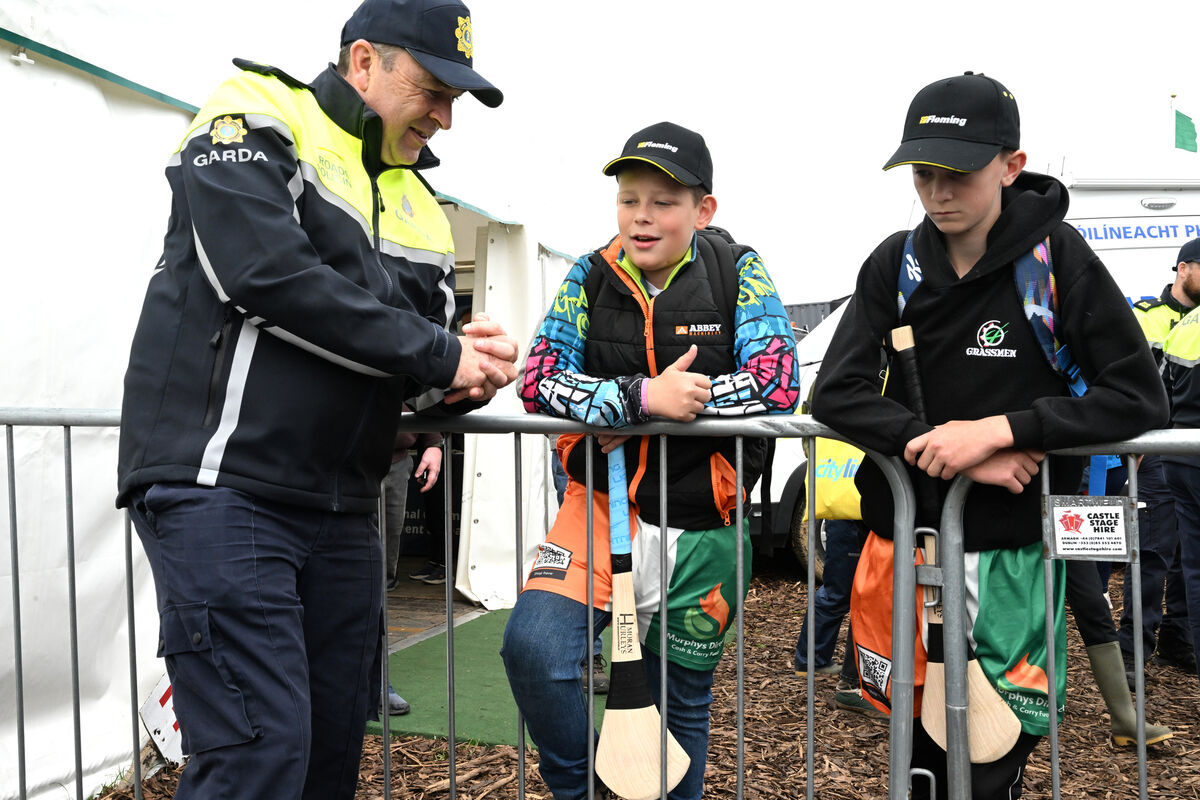 Garda Brendan Peters, Roads Policing, Thurles chatting with children at the Garda Information Stand during the 2026 National Ploughing Championships at Screggan, Tullamore, Co Offaly. Picture: Larry Cummins Garda Brendan Peters, Roads Policing, Thurles chatting with children at the Garda Information Stand during the 2026 National Ploughing Championships at Screggan, Tullamore, Co Offaly. Picture: Larry Cummins
