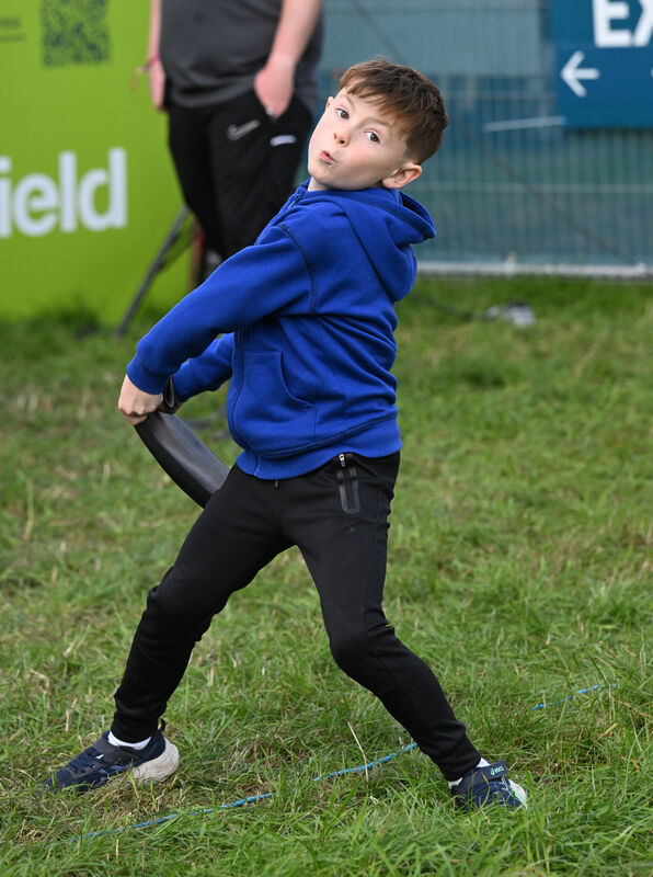  Seven-year-old Ian O'Grady from Mayo puts some welly into his throw at the Portwest Welly Throwing competition in association with Dunlop with proceeds going to the charity SOSad at the Ploughing this week. Picture: Larry Cummins
