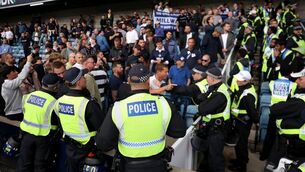 <p>Police holding back Millwall fans at the final whistle after the Sky Bet Championship match at the The Den, London. Picture: Steven Paston/PA Wire. </p> <p>Police holding back Millwall fans at the final whistle after the Sky Bet Championship match at the The Den, London. Picture: Steven Paston/PA Wire. </p>