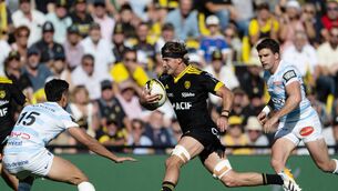 <p> La Rochelle's French flanker Oscar Jégou (C) runs with the ball during the French Top14 rugby union match between Stade Rochelais (La Rochelle) and Racing 92 at The Marcel-Deflandre Stadium in La Rochelle, western France, on September 19, 2026. (Photo by XAVIER LEOTY / AFP via Getty Images)</p>
