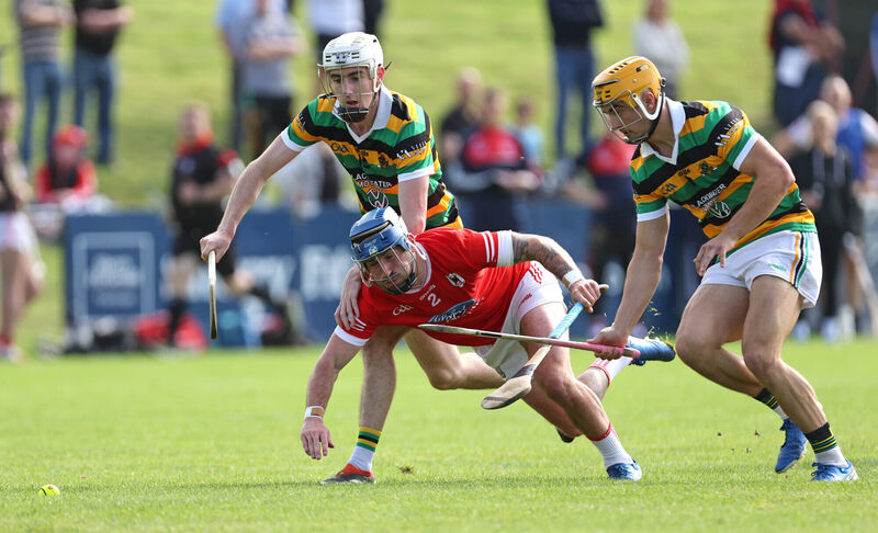 Eoin O'Leary and Micheal Mullins of Glen Rovers, against Darren Butler of Charleville. Pic: Jim Coughlan Eoin O'Leary and Micheal Mullins of Glen Rovers, against Darren Butler of Charleville. Pic: Jim Coughlan