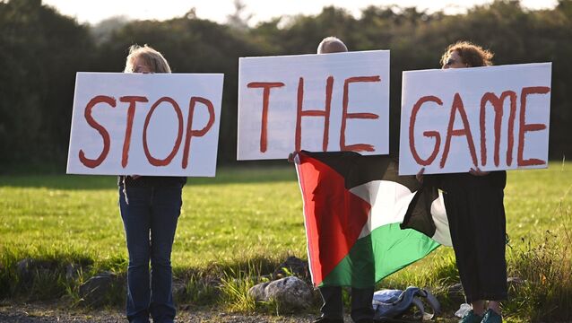 <p>STOP THE GAME protesters outside the ground, calling for Republic of Ireland's upcoming matches against Israel to be stopped, before the SSE Airtricity Men’s Premier Division match between Galway United and Shelbourne at Eamonn Deacy Park in Galway. Photo by Piaras Ó Mídheach/Sportsfile</p>