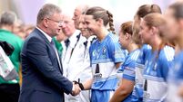 Brian Molloy greets  Aimée Collier ahead of the game 9/8/2026