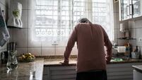 Senior man feeling pain at home