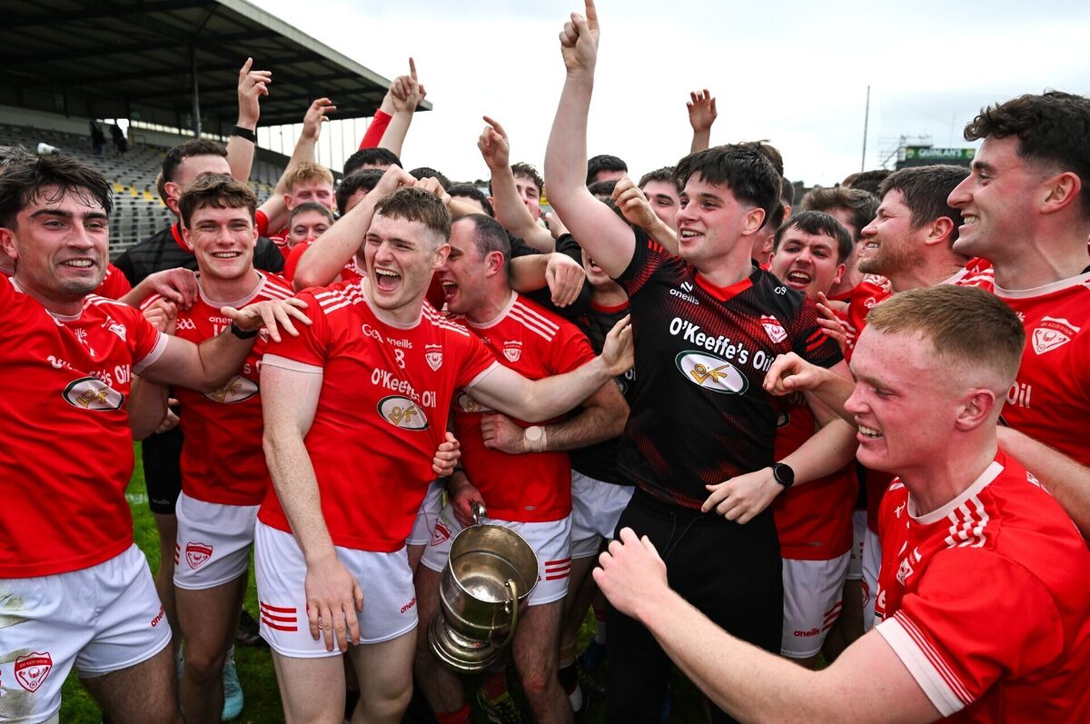 Rathmore players celebrate with the Michael O'Connor cup. Pic: Brendan Moran/Sportsfile