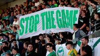 Rovers' fans with a ‘Stop The Game’ banner 7/8/2026