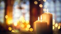 Candles in a church background
