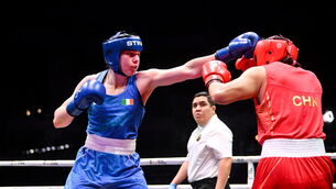 <p>Aoife O'Rourke, left, in action against Lina Wang of China in their Women's 75kg semi-final bout of the World Boxing Championships 2025 at M&amp;S Bank Arena in Liverpool. Pic: Ben McShane/Sportsfile</p>