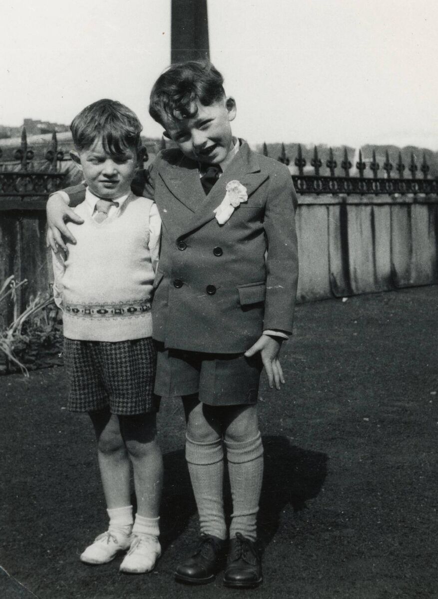 Dónal Gallagher with Rory Gallagher pictured on the roof of the Metropole Hotel in Cork around 1954, for Rory's First Communion. Picture: Courtesy of the Gallagher family 