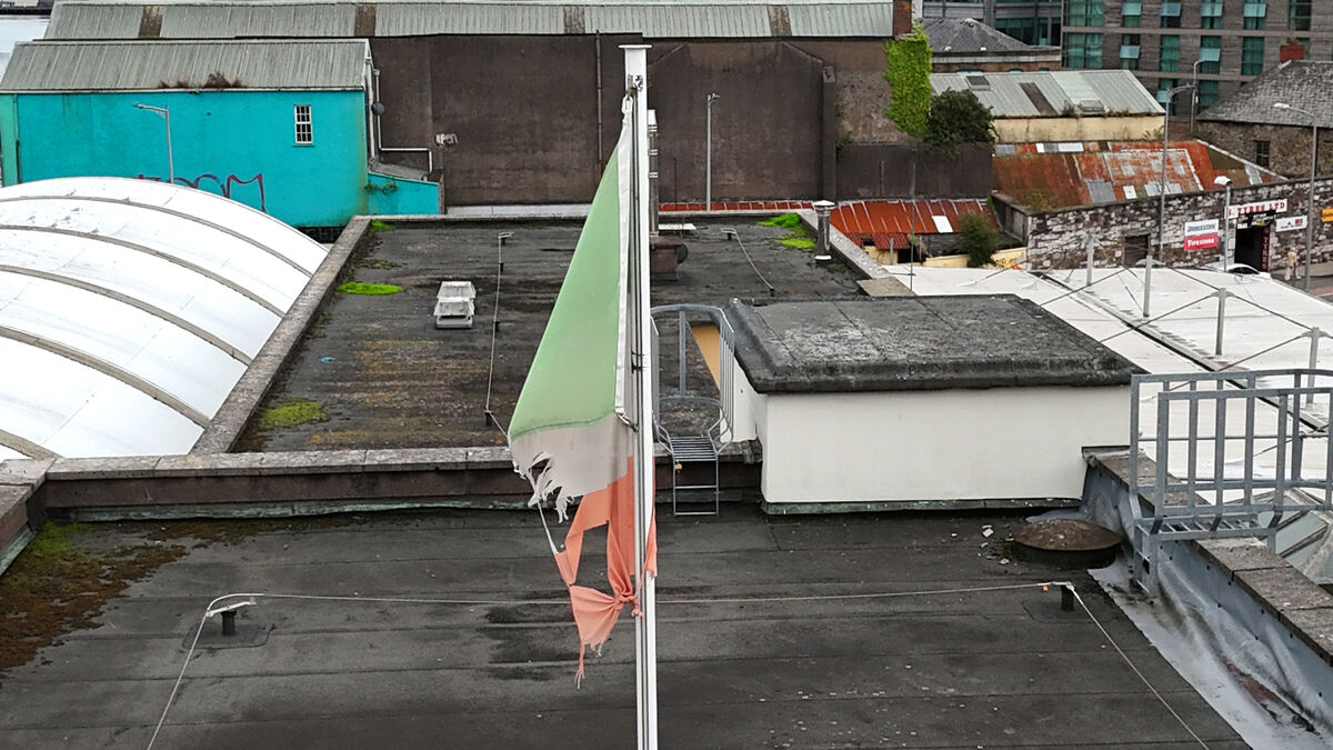  A frayed and discoloured national tricolour flag is currently flying at the Bus Station at Parnell Place, Cork City. Picture: Larry Cummins