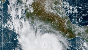 Hurricane Polo in the Pacific Ocean off the coast of Mexico (NOAA via AP) Hurricane Polo in the Pacific Ocean off the coast of Mexico (NOAA via AP)