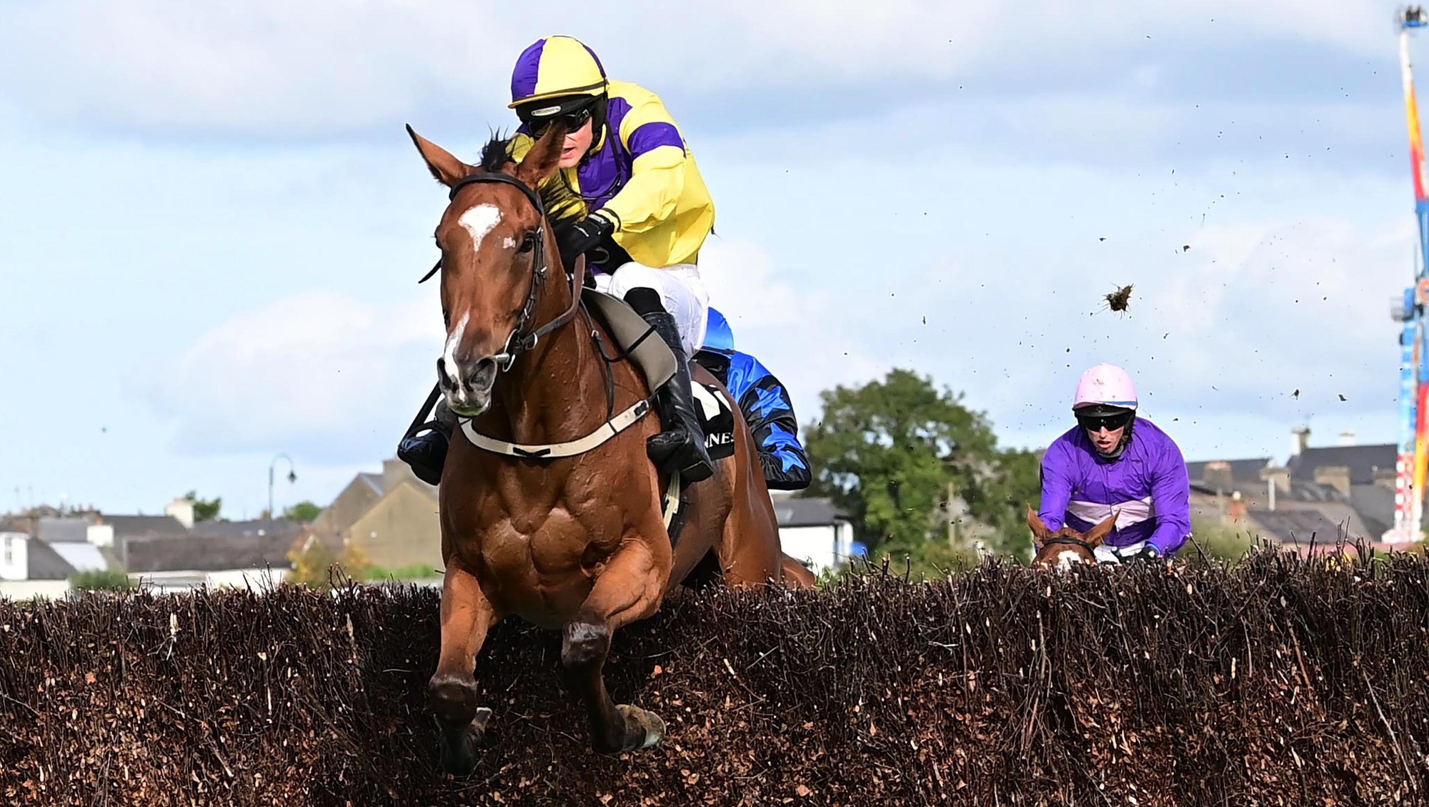Ballygunner Castle & Danny Mullins (yellow) win the Guinness Kerry National. Pic: Healy Racing