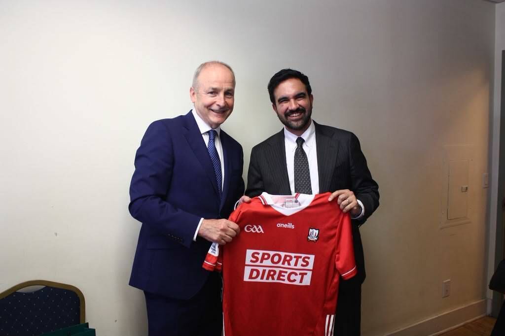 Micheál Martin presents Zohran Mamdani with a Cork GAA jersey. Micheál Martin presents Zohran Mamdani with a Cork GAA jersey.