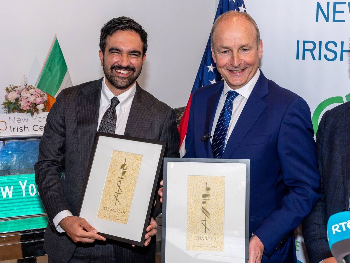 Mayor of New York Zohran Mamdani and Taoiseach Micheál Martin receive artwork of their surnames in Ogham, the ancient Irish alphabet, in the New York Irish Center, during a visit to the Long Island City premises to call a game of bingo. Mayor of New York Zohran Mamdani and Taoiseach Micheál Martin receive artwork of their surnames in Ogham, the ancient Irish alphabet, in the New York Irish Center, during a visit to the Long Island City premises to call a game of bingo.