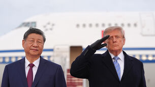 US President Donald Trump and China’s President Xi Jinping during an arrival ceremony at Joint Base Andrews (Alex Brandon/AP)
