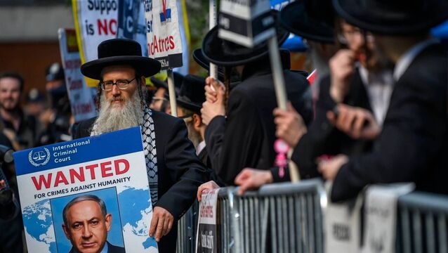 <p>A member of the Neturei Karta holds a sign against Prime Minister of Israel, Benjamin Netanyahu, outside of the 'No More Excuses Rally Against Antisemitism' held outside of the 81st session of the United Nations (UN) General Assembly at UN Headquarters on September 23, 2026 in New York City. Picture: Alexi J. Rosenfeld/Getty Images</p>
