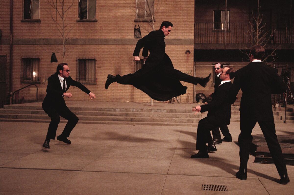 Hugo Weaving and Keanu Reeves in a scene from The Matrix Reloaded. Hugo Weaving and Keanu Reeves in a scene from The Matrix Reloaded.