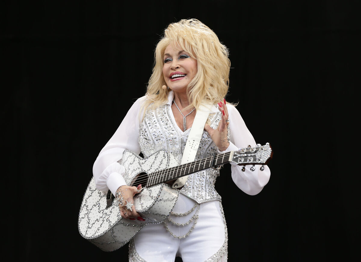 Bono and the late Dolly Parton sing together on Torn, which is described as a song about broken family ties.