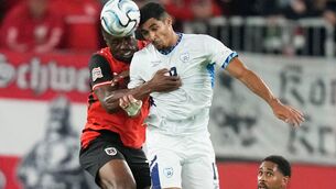 <p>Israel's Anan Khalaili, right, challenges Austria's Kevin Danso during the Nations League Group B3 game. Pic: AP Photo/Matthias Schrader)</p>