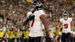 <p>Bijan Robinson of the Atlanta Falcons celebrates after scoring a touchdown against the Green Bay Packers during the first quarter of the game at Lambeau Field on September 24, 2026 in Green Bay, Wisconsin. (Photo by Geoff Stellfox/Getty Images)</p>